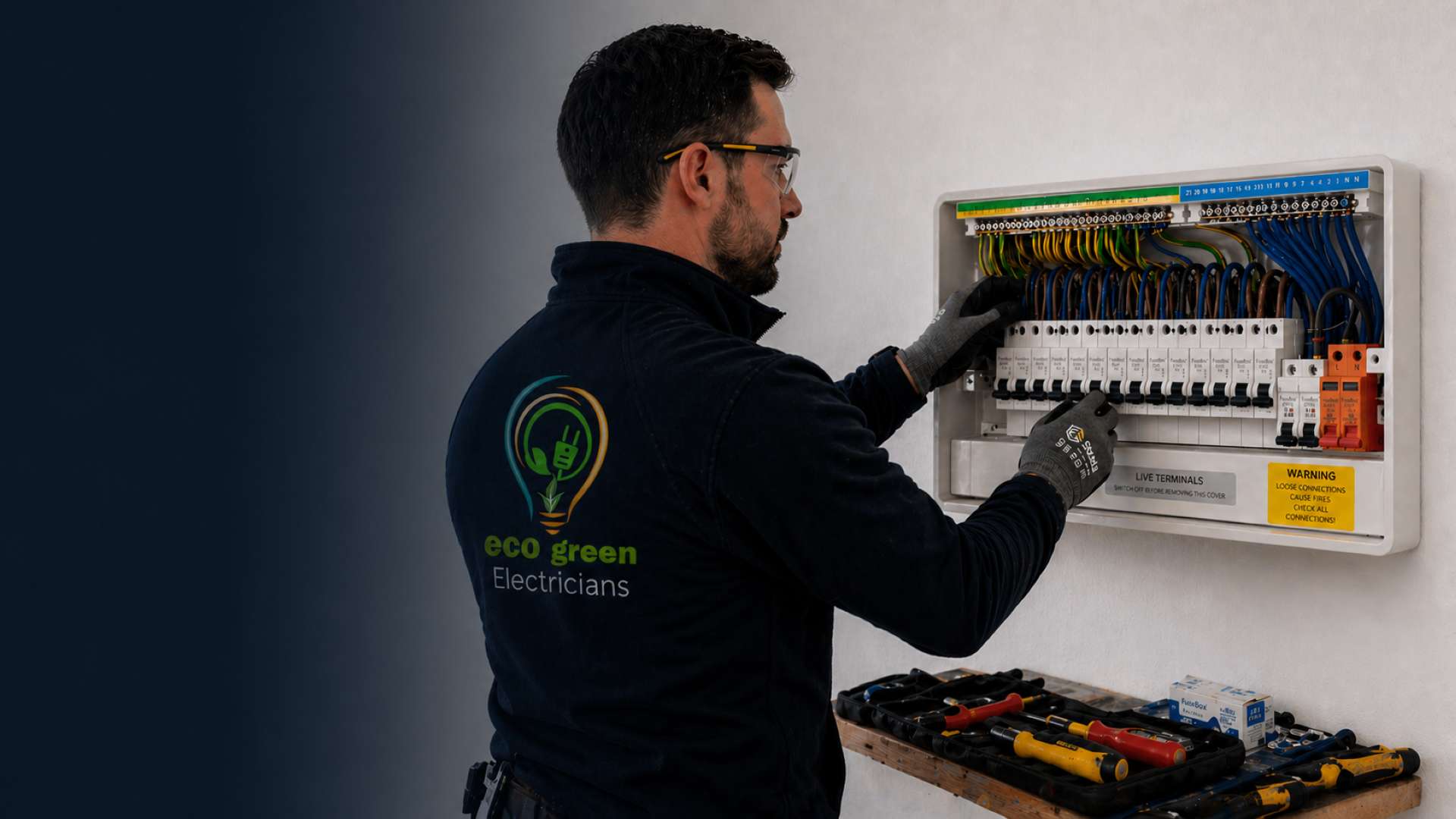 Electrician working on a consumer unit